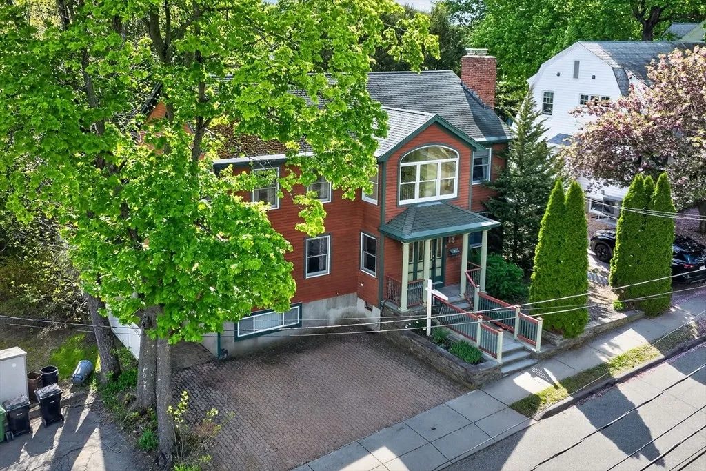 Aerial view over 8 Hawthorne St showing the tree-lined dead-end street and surrounding Watertown rooftops